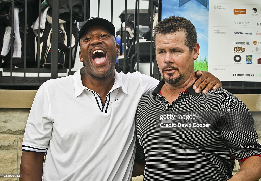 FOR USE ONLY IN SPECIAL SECTION: Host Joe Carter (left) is shares a laugh with Mitch "Wild Thing" Wi