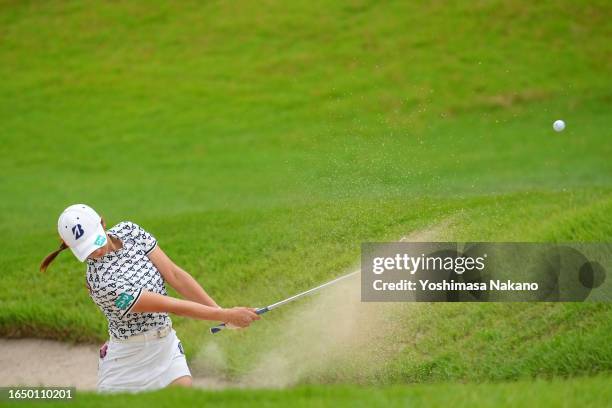 Rei Matsuda of Japan hits out from a bunker 18 during the first round of San-In Goen Musubi Ladies at Daisen Heigen Golf Club on August 31, 2023 in...