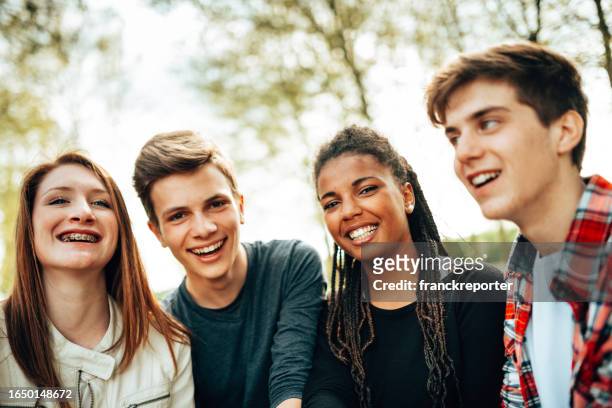 happiness friends smiling together - campus party stock pictures, royalty-free photos & images
