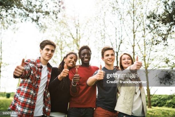 happiness friends smiling together - campus party stock pictures, royalty-free photos & images