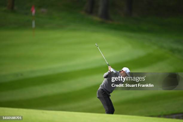 Jason Scrivener of Australia plays their second shot on the 12th hole during Day One of the Omega European Masters at Crans-sur-Sierre Golf Club on...