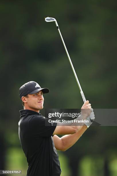 Ludvig Aberg of Sweden plays their second shot on the 17th hole during Day One of the Omega European Masters at Crans-sur-Sierre Golf Club on August...