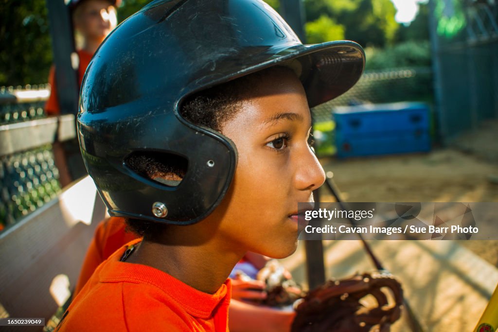 Afro American boy on the little league team