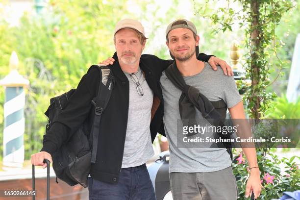 Mads Mikkelsen and guest arrives at the Hotel Excelsior pier for the 80th Venice International Film Festival 2023 on August 31, 2023 in Venice, Italy.