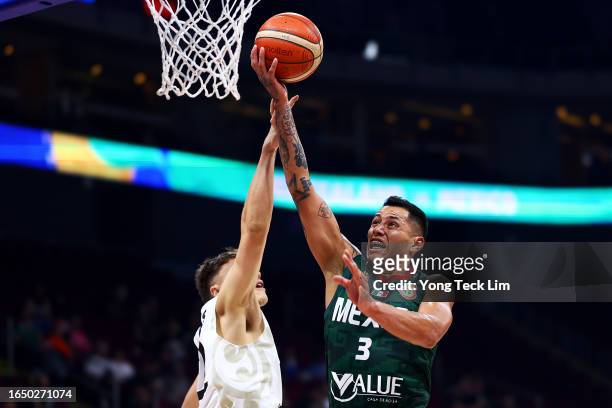 Fabian Jaimes of Mexico drives to the basket against Hyrum Harris of New Zealand in the first quarter during the FIBA Basketball World Cup...