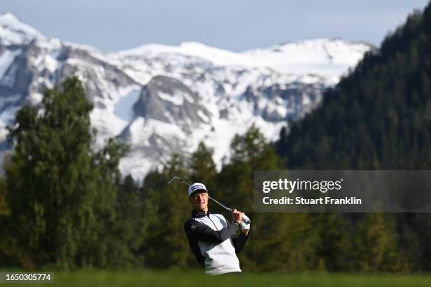 Adrian Meronk of Poland plays their second shot on the 12th hole during Day One of the Omega European Masters at Crans-sur-Sierre Golf Club on August...