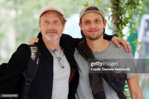 Mads Mikkelsen and Carl Jacobsen Mikkelsen arrive at the Hotel Excelsior pier for the 80th Venice International Film Festival 2023 on August 31, 2023...