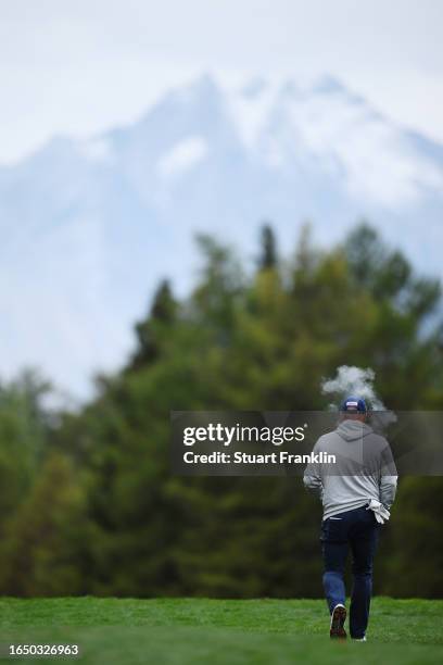 Tristen Strydom of South Africa walks on the first hole during Day One of the Omega European Masters at Crans-sur-Sierre Golf Club on August 31, 2023...