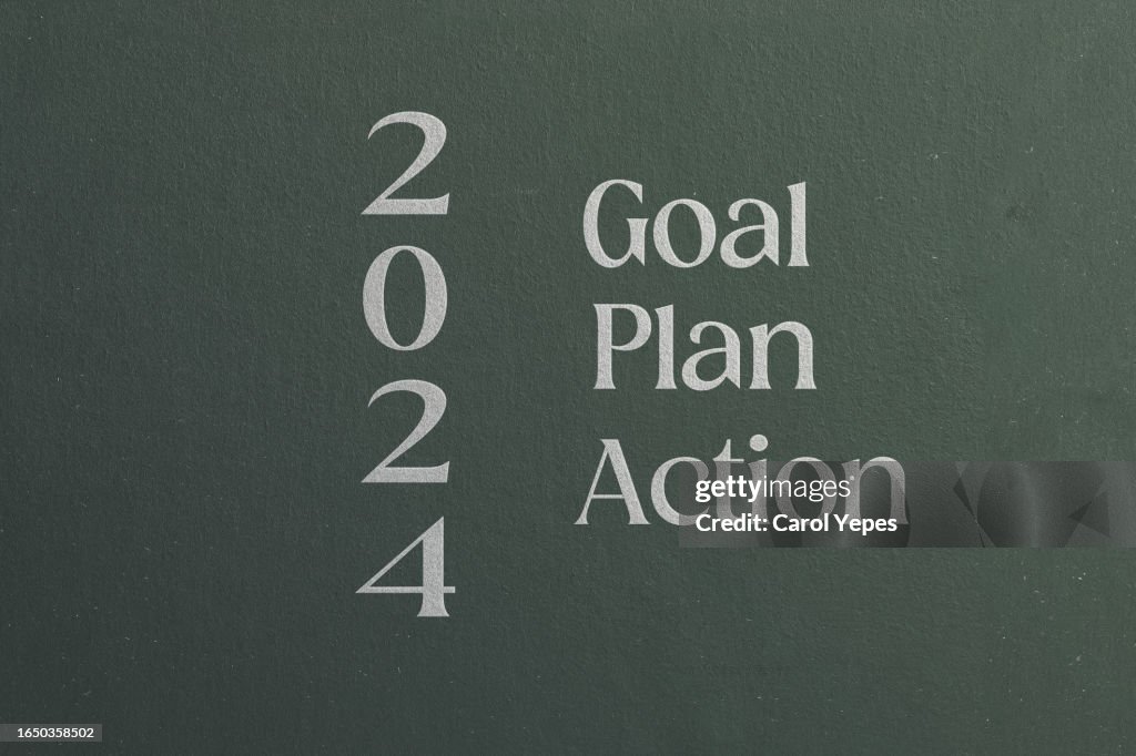 Text 2023 GOAL, PLAN and ACTION in chalkboard