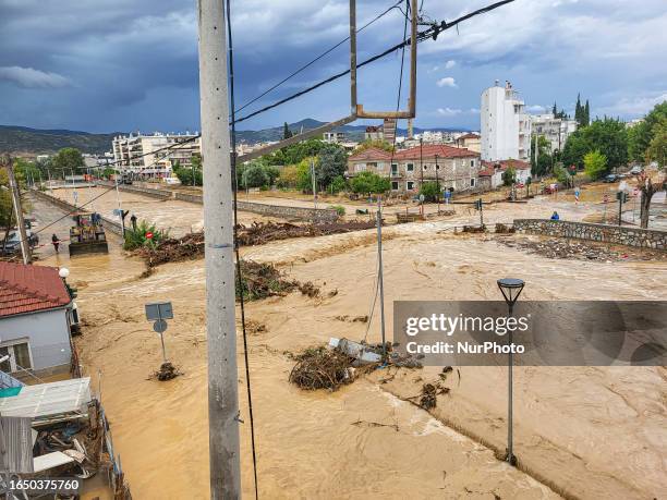 The aftermath of the fierce rainstorms hit central Greece showing the damage from the floods while roads are still covered by floodwater and mud and...