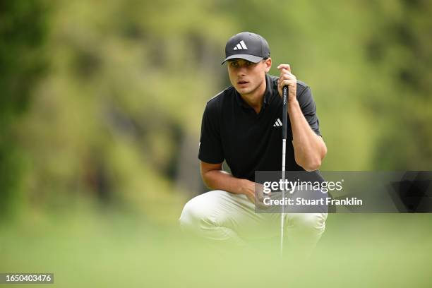 Ludvig Aberg of Sweden lines up a putt on the 6th green during Day One of the Omega European Masters at Crans-sur-Sierre Golf Club on August 31, 2023...