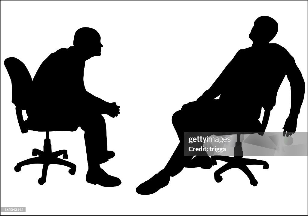 Silhouettes of two men in office chairs