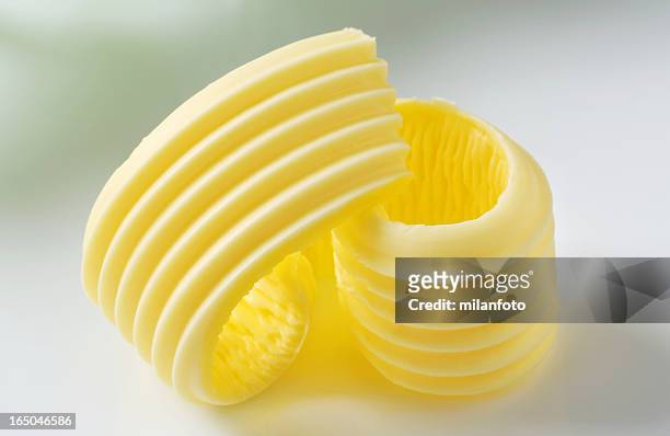 butter curl - butter curl stock-fotos und bilder