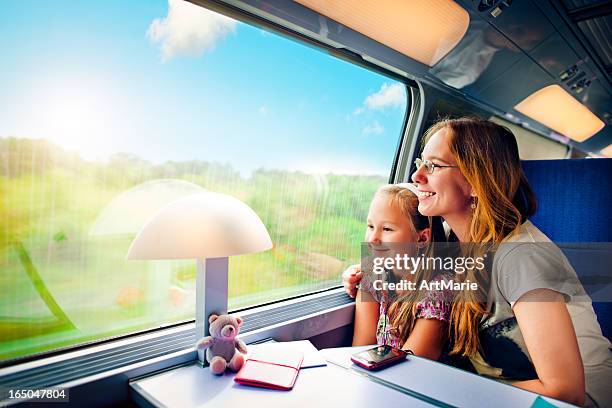 travel in train - girls on train track stock pictures, royalty-free photos & images