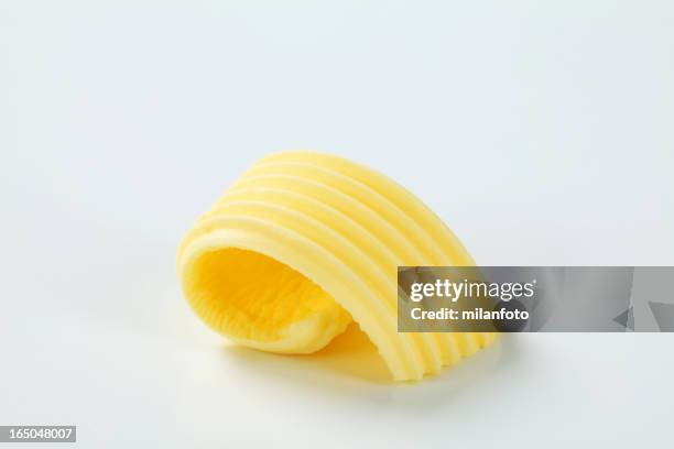 butter curl - butter curl stock pictures, royalty-free photos & images