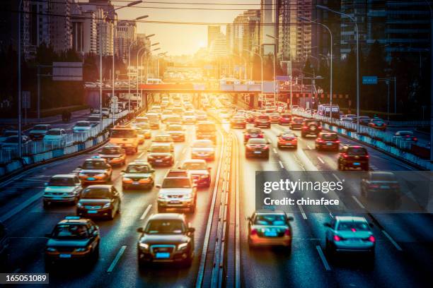 city traffic - busy highway stock pictures, royalty-free photos & images