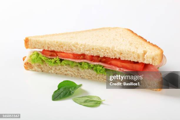 sandwich with ham and vegetables - sandwich triangle stock pictures, royalty-free photos & images