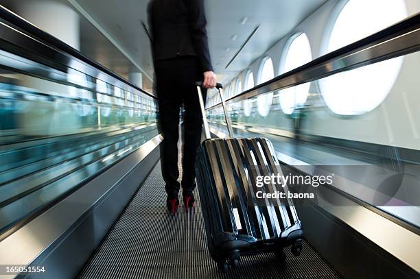 airport walkway - travolator stock pictures, royalty-free photos & images