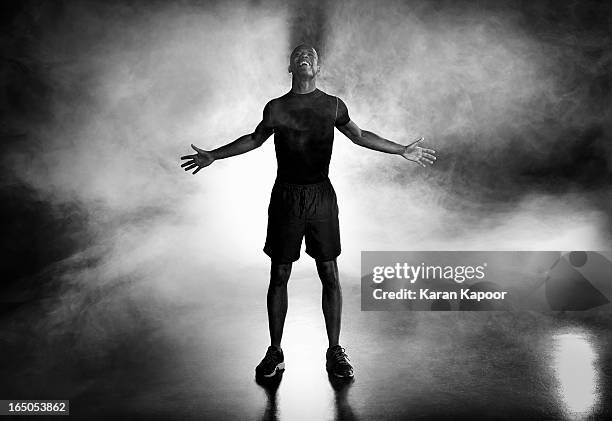 portrait of male athlete - back lit portrait stock pictures, royalty-free photos & images