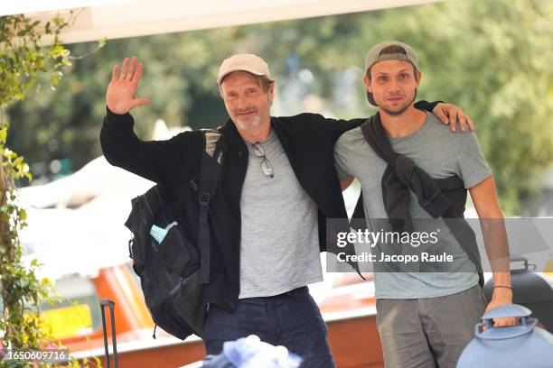 Mads Mikkelsen and Carl Jacobsen Mikkelsen are seen arriving at the 80th Venice International Film Festival 2023 on August 31, 2023 in Venice, Italy.
