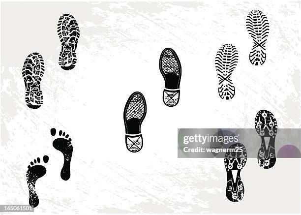 fünf footprints einschließlich schuhen und sneakers - schuhabdruck stock-grafiken, -clipart, -cartoons und -symbole