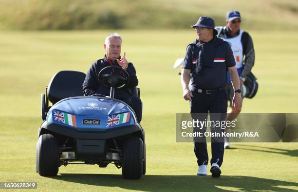 Stuart Wilson, team captain of Great Britain and Ireland and team selector, Padraig Hogan during a practice round prior to the Walker Cup at St...