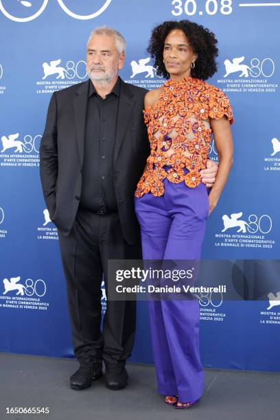 Luc Besson and Virginie Silla attend a photocall for the movie "Dogman" at the 80th Venice International Film Festival on August 31, 2023 in Venice,...