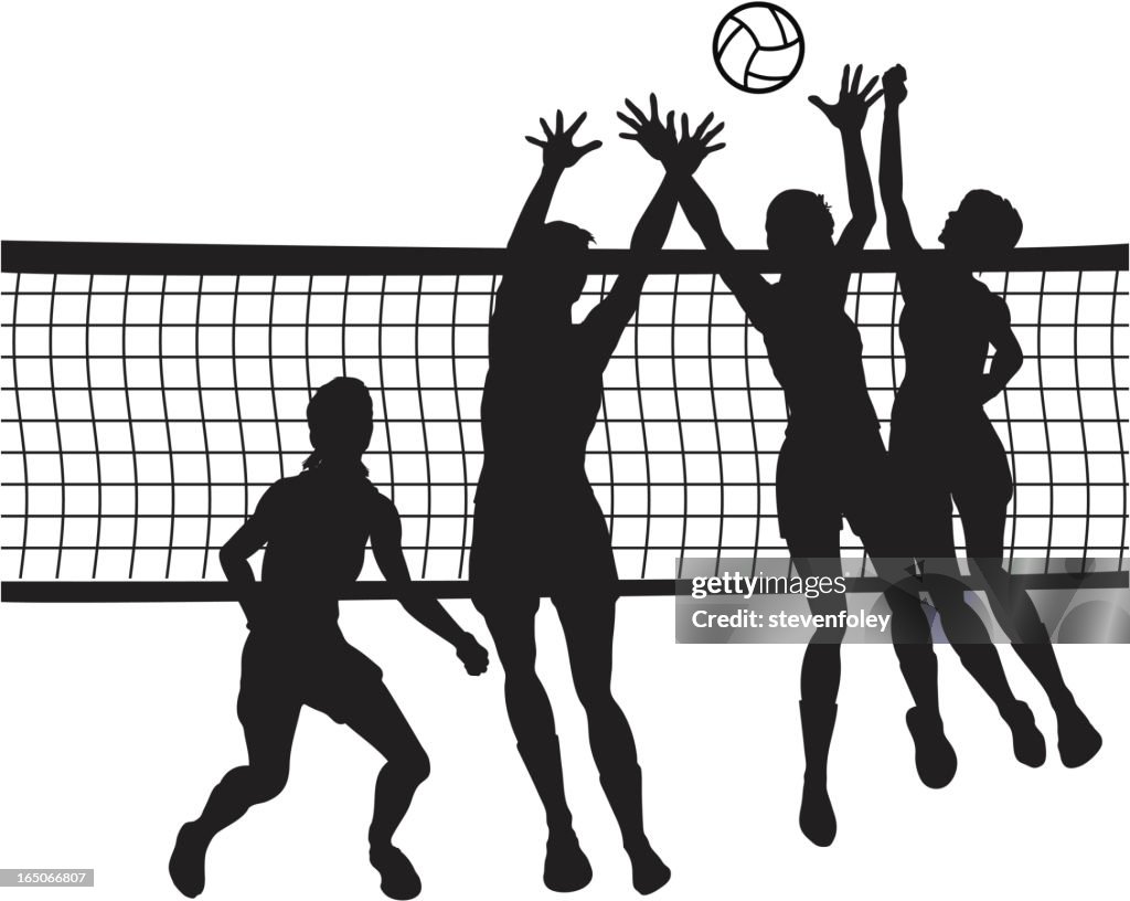 Of people jumping for volleyball in front of net