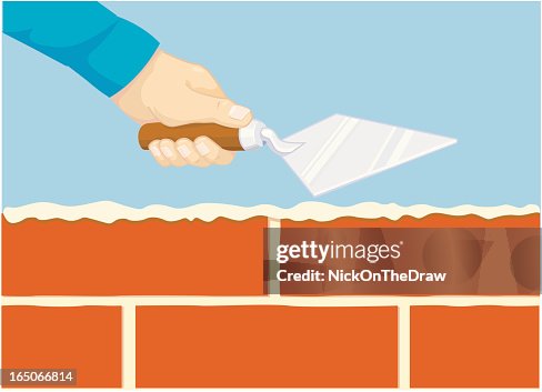 Bricklayer building a wall Bricklayer building a wall