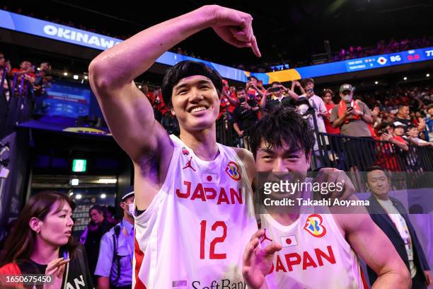 Yuta Watanabe and Makoto Hiejima of Japan celebrate the victory after the FIBA Basketball World Cup Classification 17-32 Group O game between Japan...