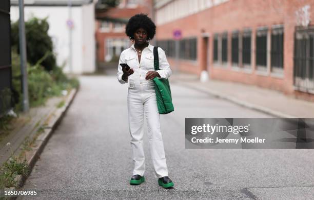 Rosena Louise Bousquet-Egehave seen wearing gold earrings / big hoops, gold necklaces, white denim long jeans overall / jumpsuit, Copenhagen Studios...