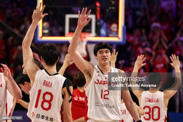 Yuta Watanabe and Yudai Baba of Japan applaud the fans after the FIBA Basketball World Cup Classification 17-32 Group O game between Japan and...