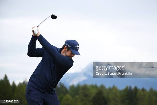 Nacho Elvira of Spain plays a shot on the range during Day One of the Omega European Masters at Crans-sur-Sierre Golf Club on August 31, 2023 in...