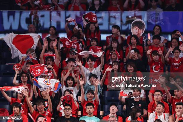 Team Japan fans cheer during the FIBA Basketball World Cup Classification 17-32 Group O game between Japan and Venezuela at Okinawa Arena on August...