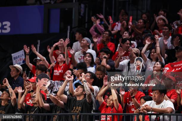 Team Japan fans cheer during the FIBA Basketball World Cup Classification 17-32 Group O game between Japan and Venezuela at Okinawa Arena on August...