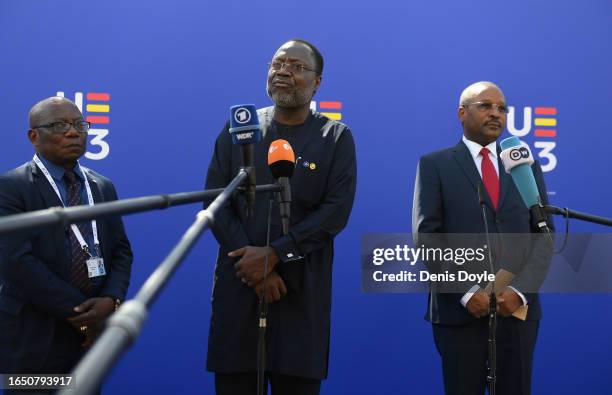 Omar Alieu Touray, President of The Economic Community of West African States addresses members of the media beside Hassoumi Massoudou , Foreign...