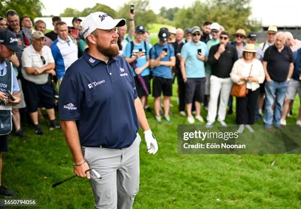 Kildare , Ireland - 7 September 2023; Shane Lowry of Ireland watches his second shot, from the rough, on the ninth hole during day one of the Horizon...