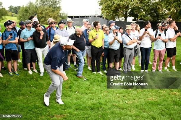 Kildare , Ireland - 7 September 2023; Shane Lowry of Ireland watches his second shot, from the rough, on the ninth hole during day one of the Horizon...