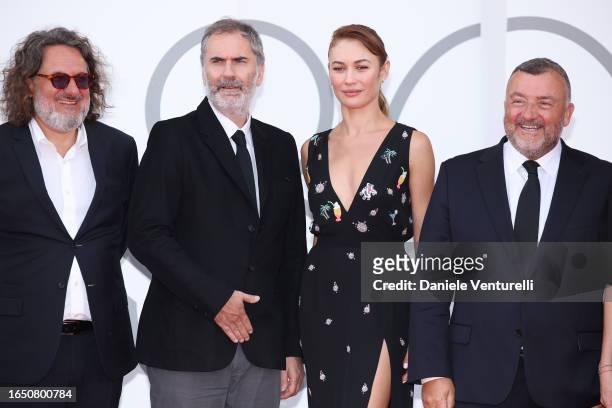 Xavier Giannoli and Olga Kurylenko from "D'Argent Et De Sang " attend a red carpet for the movie "El Conde" at the 80th Venice International Film...