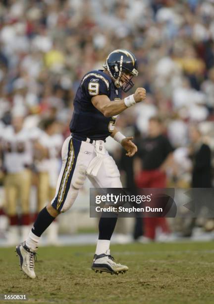 Drew Brees of the San Diego Chargers celebrates his touchdown pass late in the fourth quarter which tied the game with the San Francisco 49ers in...