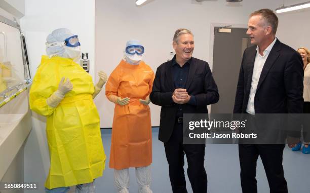 Labour Party leader Sir Keir Starmer and Shadow Secretary of State for Science, Innovation and Technology Peter Kyle talk to AstraZeneca employees as...