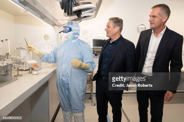Labour Party leader Sir Keir Starmer and Shadow Secretary of State for Science, Innovation and Technology Peter Kyle talk to AstraZeneca employees as...