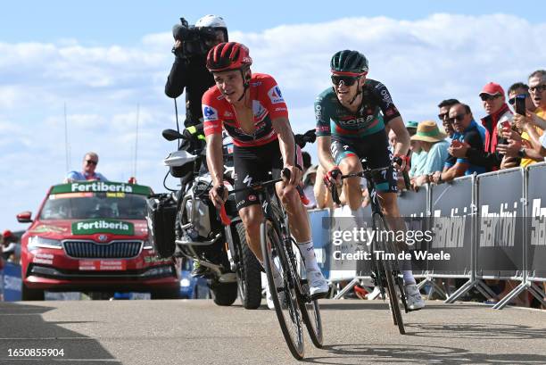 Remco Evenepoel of Belgium and Team Soudal - Quick Step - Red Leader Jersey and Aleksandr Vlasov of Russia and Team BORA - Hansgrohe cross the finish...