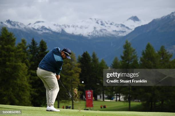 Thriston Lawrence of South Africa plays their second shot on the 12th hole during Day One of the Omega European Masters at Crans-sur-Sierre Golf Club...