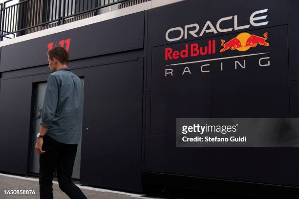 General view of man walking near the Red Bull logo on a truck in the paddock of the Monza Circuit during previews ahead of the F1 Grand Prix of Italy...