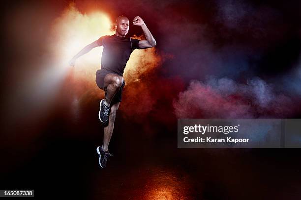 athelete leaping - sport motivation stock pictures, royalty-free photos & images