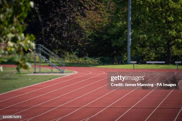 An empty running track in Finsbury Park, north London as forecasters are predicting a "last dose of summer", with warm spells reaching 32C on...