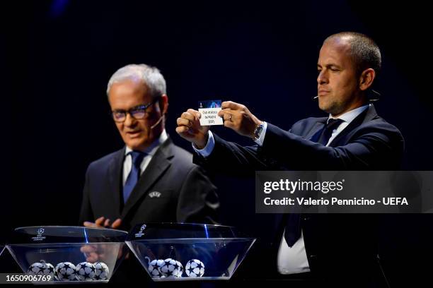 Special Guest Joe Cole draws out the name of Club Atletico de Madrid during the UEFA Champions League 2023/24 Group Stage Draw at Grimaldi Forum on...