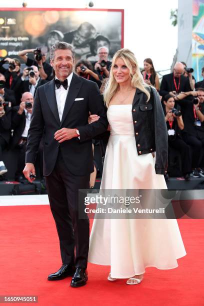Patrick Dempsey and Jillian Fink attend a red carpet for the movie "Ferrari" at the 80th Venice International Film Festival on August 31, 2023 in...