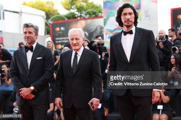 Patrick Dempsey, Michael Mann and Adam Driver attend a red carpet for the movie "Ferrari" at the 80th Venice International Film Festival on August...